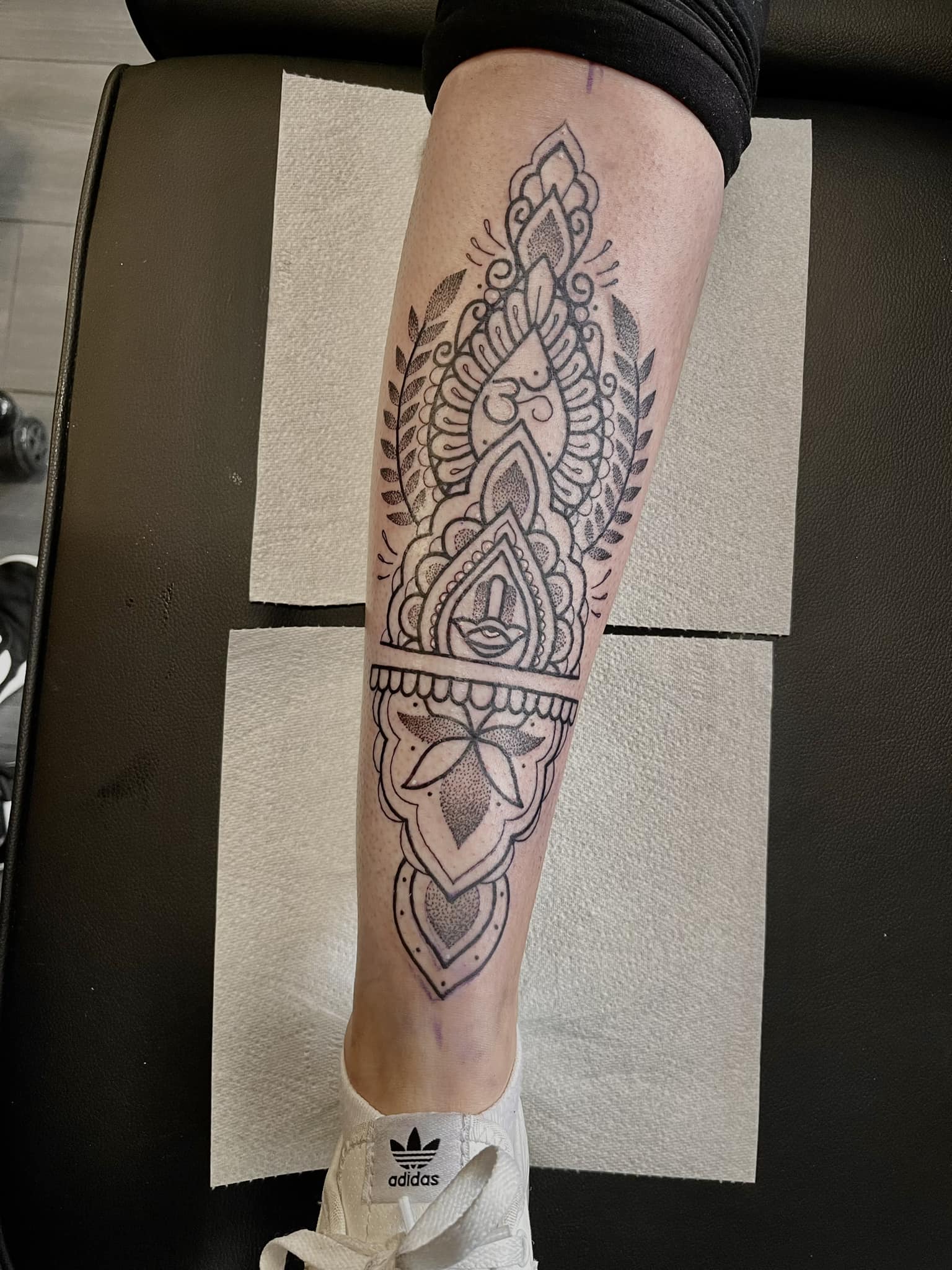 back of leg mandala tattoo